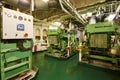 Panoramic view of marine diesel generators on a merchant ship in the engine room