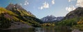 Panoramic view of Maroon Bells peaks and fall colors in the Rocky Mountain National Park Royalty Free Stock Photo