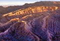 Panoramic view of the Mars Valley near San Pedro de Atacama against a blue dramatic blue sky.