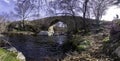 Panoramic view of the Medieval Bridge of Matafrailes, over the creek of Canencia, one of the Medieval Bridges of Lozoya, Madrid,