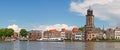 Panoramic view of the medieval Dutch city Deventer with the Great Church of Lebuinesker alongside the IJssel river Royalty Free Stock Photo