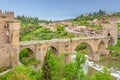 Old stone bridge spans over a river