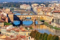 Panoramic view of medieval stone bridge Ponte Vecchio over Arno river in Florence, Tuscany, Italy Royalty Free Stock Photo
