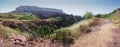 Panoramic view of Mehrangarh fort from Rao Jodha desert rock park, Jodhpur, India. Green vegetation in the foreground and