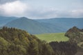 panoramic view of misty forest in western carpathian mountains. Royalty Free Stock Photo