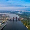 Panoramic view of a modern city with a river, unfinished bridge and park part of the city Royalty Free Stock Photo