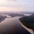 Panoramic view of a modern city with a river, unfinished bridge and park part of the city Royalty Free Stock Photo