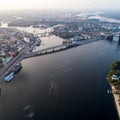 Panoramic view of a modern city with a river, unfinished bridge and park part of the city Royalty Free Stock Photo