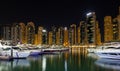 Panoramic view with modern skyscrapers and water pier of Dubai Marina