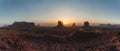 Panoramic view of Monument Valley USA Utah during Sunset and sunrise with famout view to the sisters and west mitten Royalty Free Stock Photo