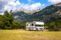 Panoramic view of MOTORHOME RV In Chilean landscape in Andes. Family trip traval vacation in mauntains