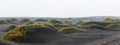 Panoramic view of mounds of black sand in the beach at Vestrahorn, Iceland