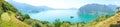 Panoramic view of mountain lake with island in the middle. Panorama from Monte Isola Island with Lake Iseo. Italian landscape. Is Royalty Free Stock Photo