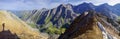 Panoramic view of the mountain landscape. Deep gorge, rocky peaks. Traveling in the mountains