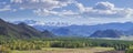 Panoramic view, mountain landscape. Spring mountain slopes and sky with white clouds Royalty Free Stock Photo