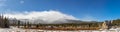 Panoramic view of the mountain range and Saint Catherine`s Chapel on the Rock. Church in the Rocky Mountains Royalty Free Stock Photo