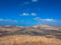 Panoramic view of mountain range with volcanoes in Timanfaya National Park, Lanzarote, Canary Islands, Spain, Europe