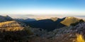 A panoramic view of the mountainous landscape of Spain at sunset.