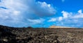 Panoramic view of mountains of fire in Timanfaya National Park. Blue cloudless sky. Lanzarote, Canary Islands, Spain, Europe Royalty Free Stock Photo