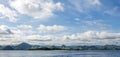 Panoramic view of the mountains and hills of the Flores coastline in Indonesia Royalty Free Stock Photo