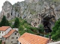 Panoramic view of the mountains, houses and Duman, the spring of the Bistrica River in the small town of Livno in Bosnia and Royalty Free Stock Photo