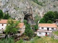 Panoramic view of the mountains, houses and Duman, the spring of the Bistrica River in the small town of Livno in Bosnia and