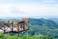 Panoramic view of mountains and meadows.wooden stand for panoramic sightseeing.