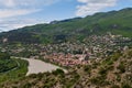 Panoramic view of Mtskheta Mccheta former capital city and one of oldest cities in Georgia on the bank of Kura river with Royalty Free Stock Photo