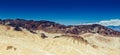 Panoramic view of mudstone and claystone badlands at Zabriskie Point. Death Valley National Park, California USA. Royalty Free Stock Photo