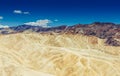 Panoramic view of mudstone and claystone badlands at Zabriskie Point. Death Valley National Park, California USA. Royalty Free Stock Photo