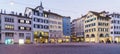 Panoramic view of Munsterhof square with Guild houses at night,