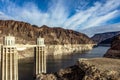 Panoramic view of the mythical Hoover Dam, between mountains on the course of the Colorado River. Royalty Free Stock Photo