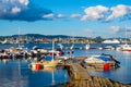 Panoramic view of Nakholmen island marina on Oslofjord harbor with metropolitan Oslo, Norway city center in background