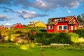 Panoramic view of Nakholmen island on Oslofjord harbor with summer cabin houses at shoreline in early autumn near Oslo, Norway