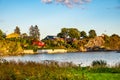 Panoramic view of Nakholmen island on Oslofjord harbor with summer cabin houses at shoreline in early autumn near Oslo, Norway