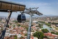 Panoramic view from the cable car to old Tbilisi. Famous Peace Bridge and Kura River on a summer day. Georgia Royalty Free Stock Photo