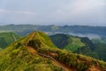 Panoramic view of natural landscape in the Azores, wonderful island of Portugal. Beautiful lagoons in volcanic craters and green f Royalty Free Stock Photo