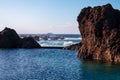 Porto Moniz - Panoramic view of natural lava swimming pools Piscinas Naturais Velhas in coastal town Porto Moniz, Madeira island