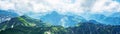 Panoramic view from Nebelhorn in Oberstdorf AllgÃÂ¤u Bavaria Germany - Beautiful Alps with lush green meadow and blue sky -