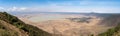 Panoramic view of the Ngorongoro Conservation Area on a clear day from the mountainside Royalty Free Stock Photo