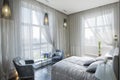 Panoramic view of nice cozy bedroom