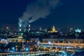 Panoramic view of night Moscow. Big city lights. Steam comes from the CHP pipes Royalty Free Stock Photo