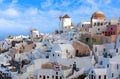 Panoramic view of Oia town at sunset, Santorini island, Cyclades, Greece Royalty Free Stock Photo