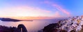 Panoramic view of Oia village and Aegean sea in sunset light, Santorini, Greece Royalty Free Stock Photo