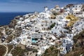 Panoramic view from Oia village with windmill on Santorini island, Greece Royalty Free Stock Photo