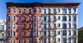 Panoramic view of old brick building against blue sky background Royalty Free Stock Photo