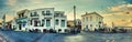 Panoramic view of the old buildings and horse carriages located on Spetson-Moni Agion Anargiron street at evening Royalty Free Stock Photo