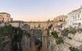 Panoramic view of the old city of Ronda, one of the famous white villages, at sunset in the province of Malaga, Andalusia, Spain Royalty Free Stock Photo