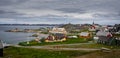 Panoramic view of the Old Colonial Harbour area including the Church of our Saviour and Hans Egede Statue in Nuuk, Greenland Royalty Free Stock Photo