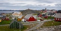 Panoramic view of the Old Colonial Harbour area including the Church of our Saviour and Hans Egede Statue in Nuuk, Greenland Royalty Free Stock Photo